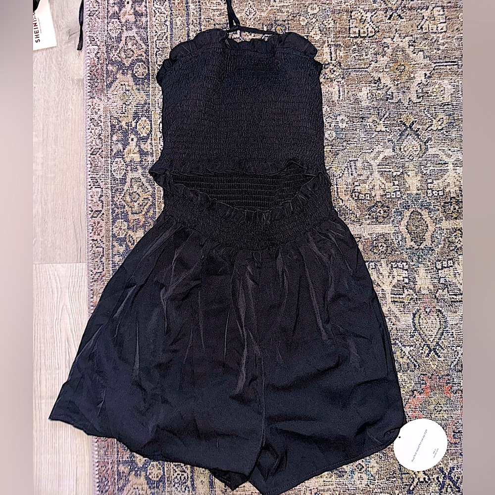 NWT black dress/ halter style with cut out in midsection